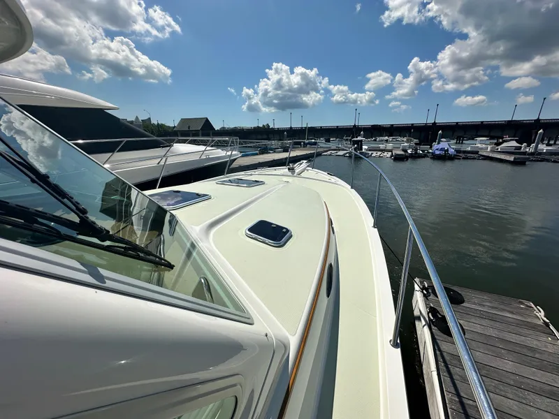 Slide: The Image of 2020 Back Cove 41 yacht docked at marina under blue sky with clouds. - 30