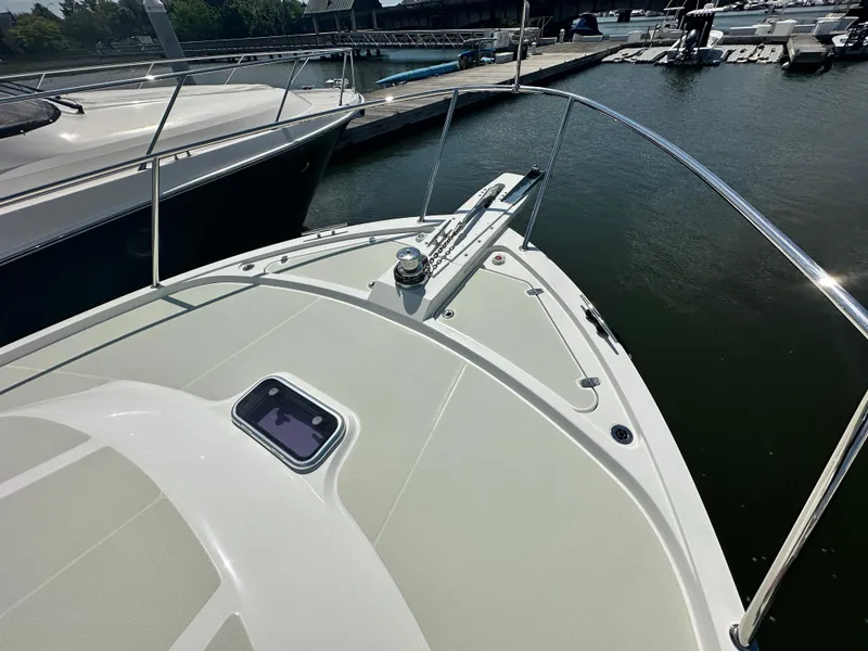 Slide: The Image of Bow of 2020 Back Cove 41 yacht docked at marina. - 32