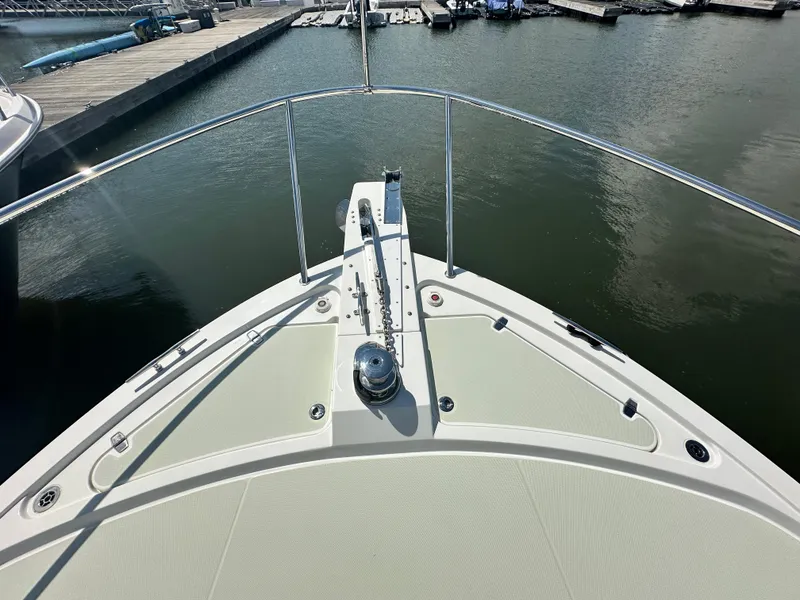 Slide: The Image of Bow view of 2020 Back Cove 41 yacht docked at marina. - 33