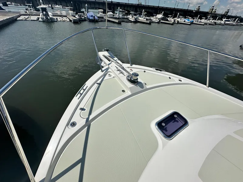Slide: The Image of Bow view of 2020 Back Cove 41 yacht docked in marina. - 38