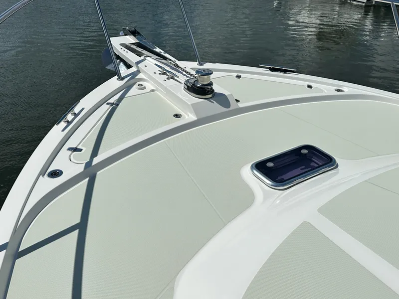 Slide: The Image of Bow of 2020 Back Cove 41 boat with deck hatch and winch. - 40