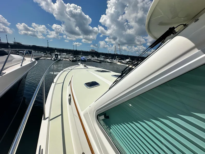 Slide: The Image of 2020 Back Cove 41 yacht docked at marina under blue sky. - 44