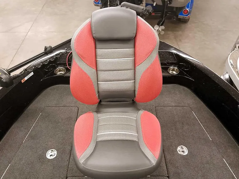 Slide: The Image of 2024 Ranger 2080MS Angler boat seat with red and gray upholstery. - 11