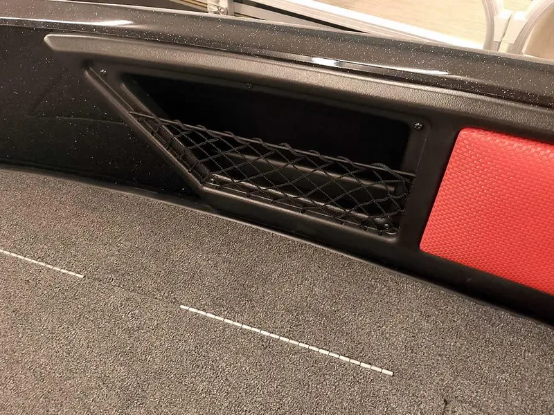 Slide: The Image of 2024 Ranger 2080MS Angler boat interior with storage compartment and red accent. - 15