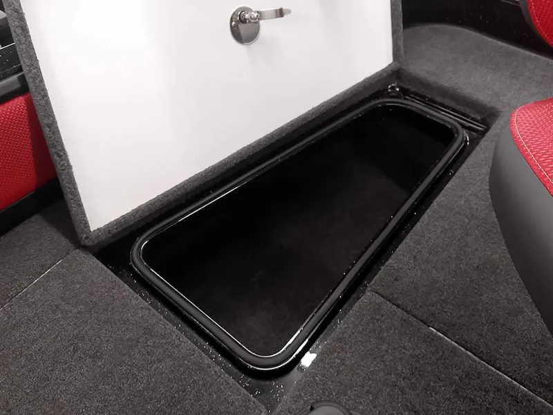 Slide: The Image of 2024 Ranger 2080MS Angler storage compartment with open hatch, showcasing interior space. - 16