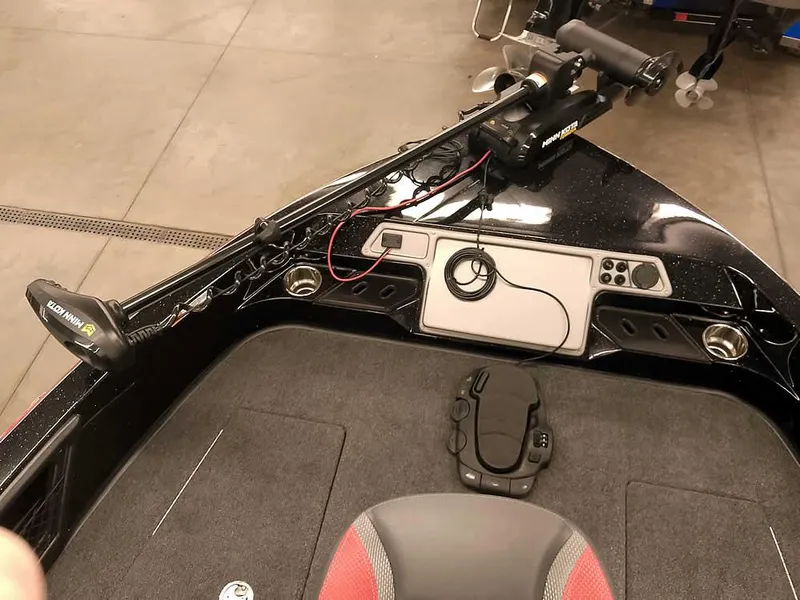 Slide: The Image of 2024 Ranger 2080MS Angler boat interior with trolling motor and control panel. - 18