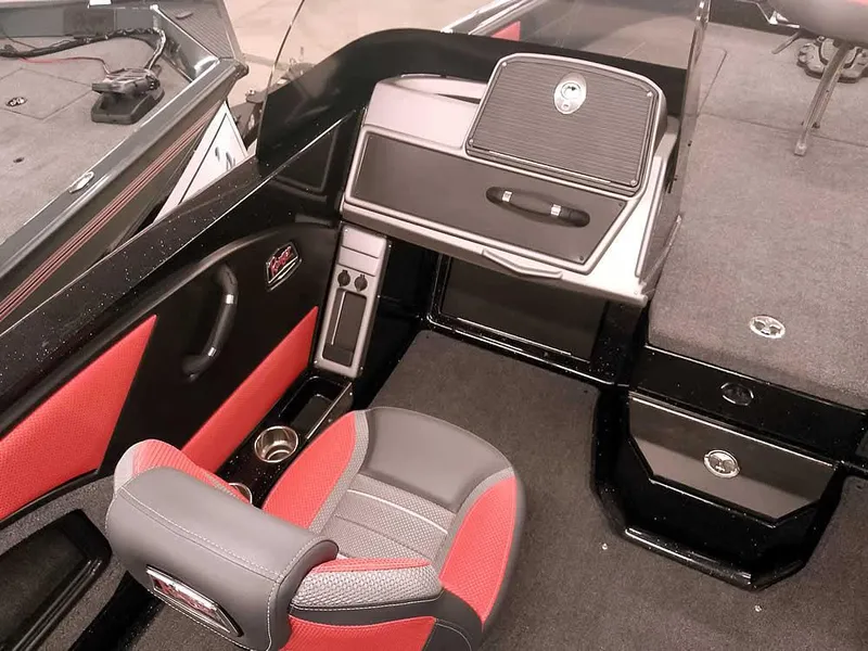 Slide: The Image of 2024 Ranger 2080MS Angler boat interior with red and gray seating and storage compartments. - 21