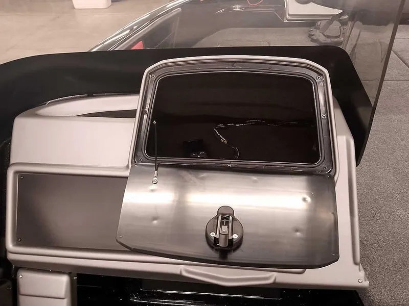 Slide: The Image of 2024 Ranger 2080MS Angler boat compartment with sleek, modern design and secure latch. - 22