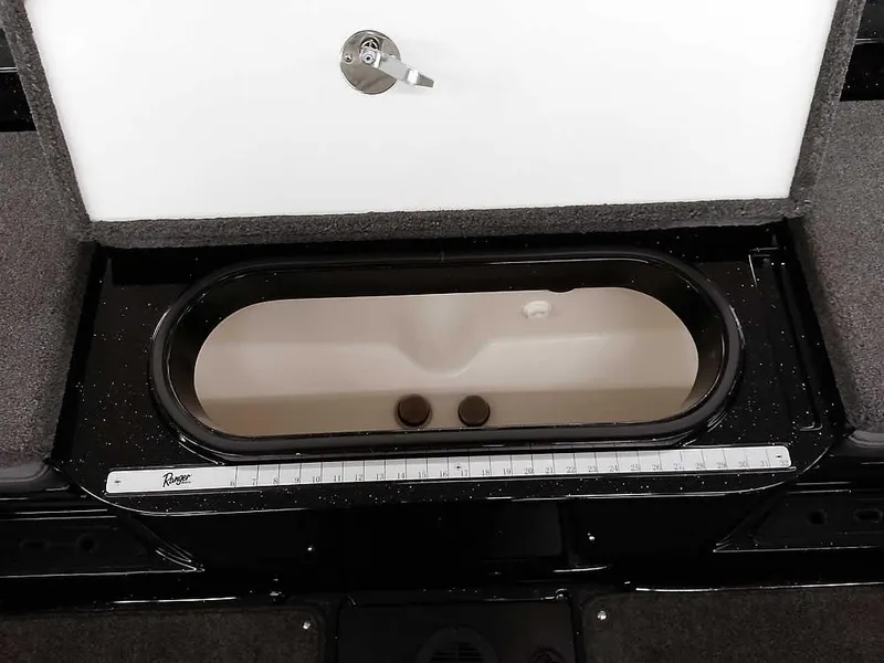 Slide: The Image of 2024 Ranger 2080MS Angler livewell with measuring ruler and secure latch. - 33
