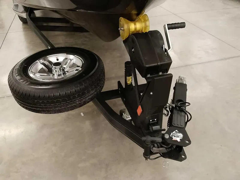 Slide: The Image of Trailer hitch and spare tire of 2024 Ranger 2080MS Angler boat. - 34