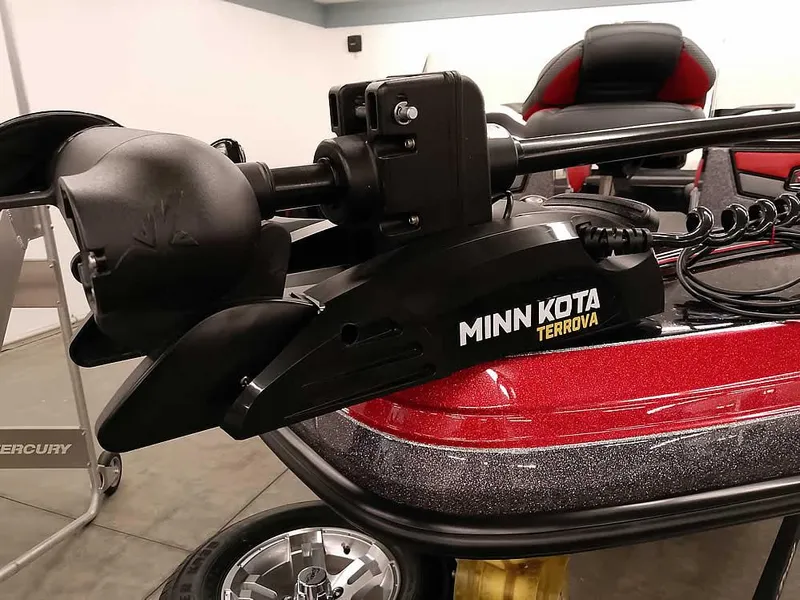 Slide: The Image of 2024 Ranger 2080MS Angler with Minn Kota Terrova trolling motor, red and black design. - 5