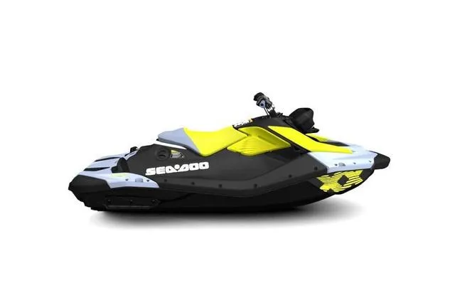 Slide: The Image of 2024 Sea-Doo SPARK TRIXX 1UP Waverunner, black and yellow, side view. - 1