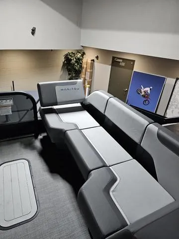 Slide: The Image of 2025 Manitou 20' Cruise Bench with 150HP Stealth Motor, sleek interior design. - 12