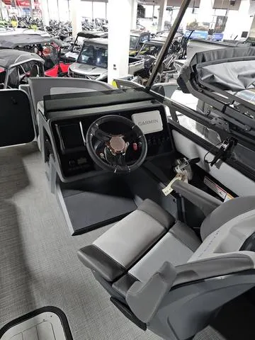 Slide: The Image of 2025 Manitou 20' Cruise Bench Max Deck with 150HP Stealth Motor, interior view. - 15