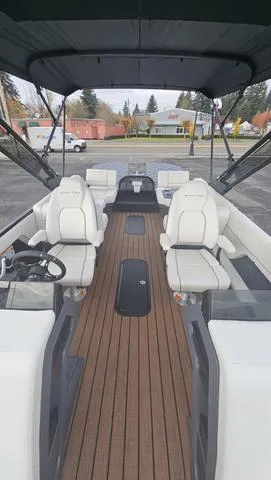 Slide: The Image of 2025 Manitou 24 EXPLORE DUAL MOTOR NAVIGATOR with spacious seating and modern design. - 21