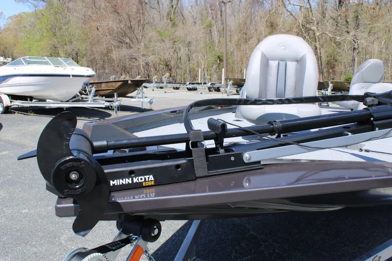 Slide: The Image of 2025 G3 Sportsman 1610 boat with Minn Kota Edge trolling motor in a parking lot. - 10