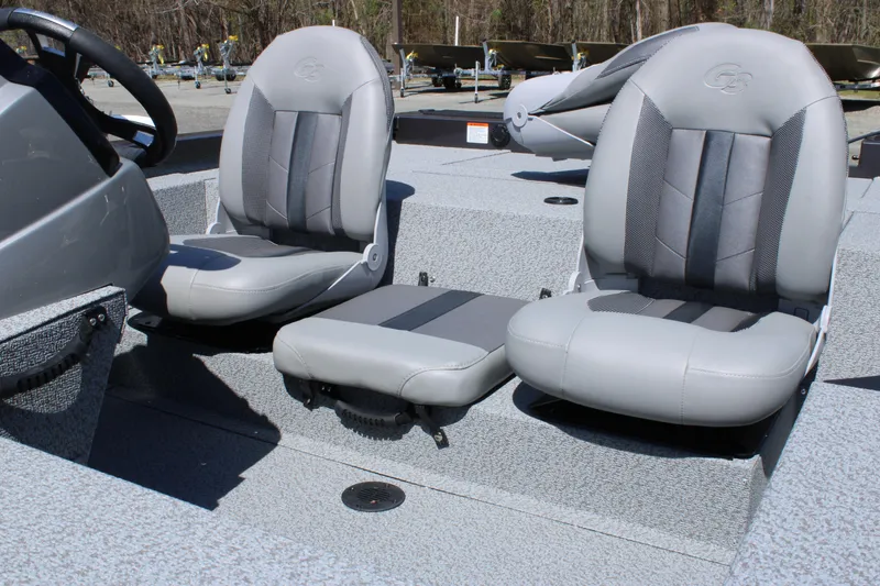 Slide: The Image of 2025 G3 Sportsman 1610 boat interior with two gray seats. - 13