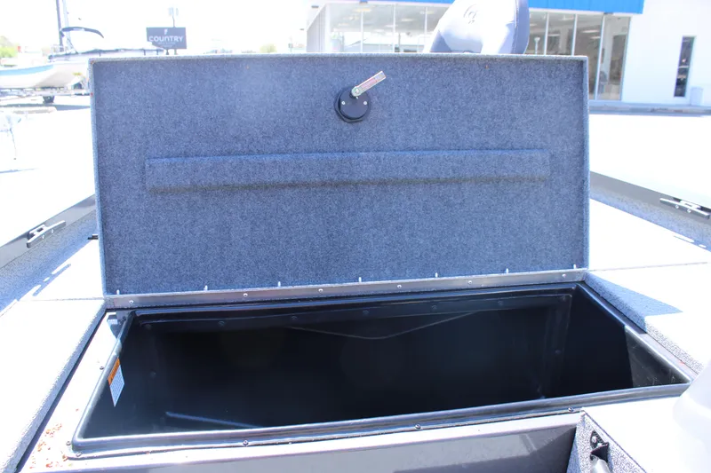 Slide: The Image of Open storage compartment of 2025 G3 Sportsman 1610 boat, showcasing interior space. - 16