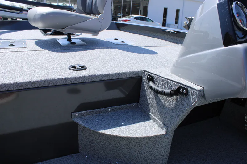 Slide: The Image of 2025 G3 Sportsman 1610 boat interior with seating and textured flooring. - 20