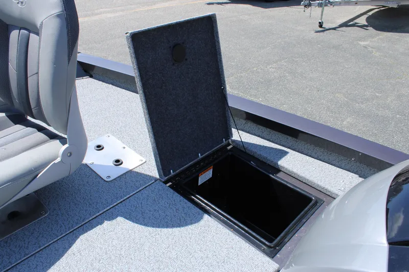 Slide: The Image of 2025 G3 Sportsman 1610 boat with open storage compartment and seating. - 22