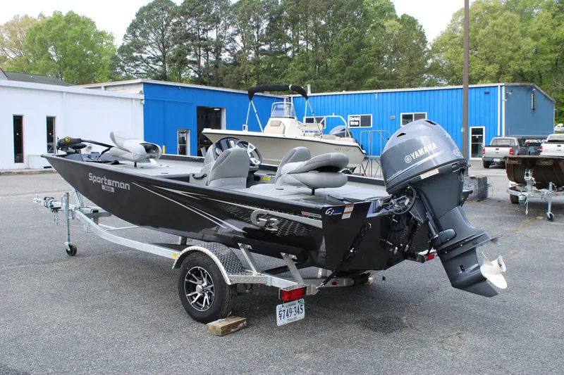 Slide: The Image of 2025 G3 Sportsman 1610 boat with Yamaha motor on trailer, parked outdoors. - 3
