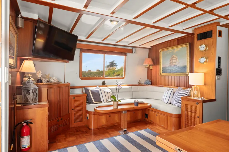 Slide: The Image of Luxurious 1996 Kadey-Krogen 48 Whaleback yacht interior with cozy seating and nautical decor. - 22
