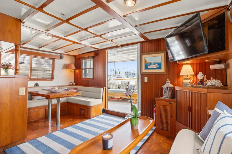 Slide: The Image of Luxurious 1996 Kadey-Krogen 48 Whaleback yacht interior with elegant wood finish and cozy seating. - 24