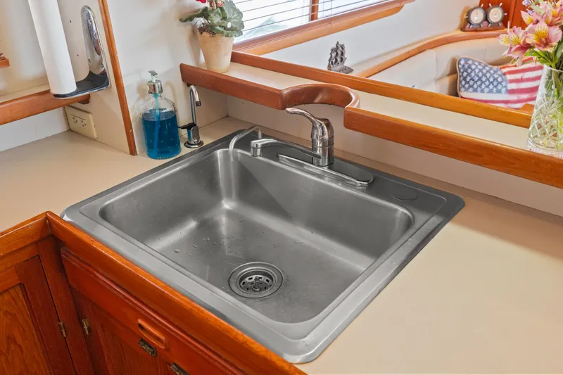 Slide: The Image of Stainless steel sink in Kadey-Krogen 48 Whaleback yacht kitchen, 1996 model. - 30