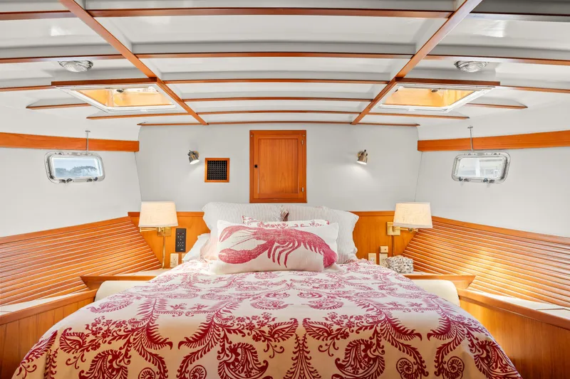 Slide: The Image of Luxurious 1996 Kadey-Krogen 48 Whaleback bedroom with elegant wood accents and nautical decor. - 41