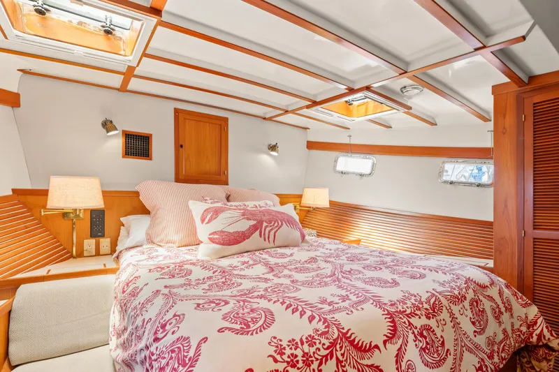 Slide: The Image of Cozy bedroom in 1996 Kadey-Krogen 48 Whaleback yacht with nautical decor. - 42