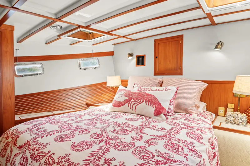 Slide: The Image of Luxurious 1996 Kadey-Krogen 48 Whaleback bedroom with nautical decor and elegant bedding. - 43