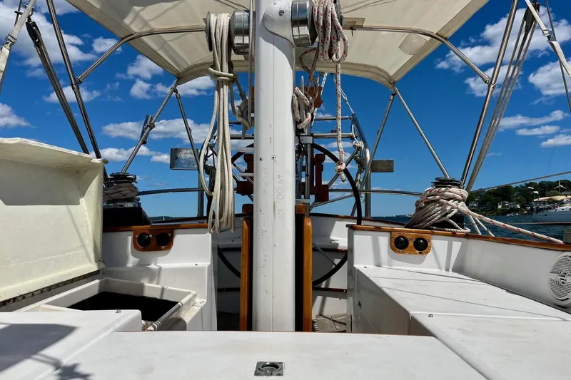 Slide: The Image of Cockpit view of 1979 Cherubini 44 sailboat with clear blue sky background. - 6