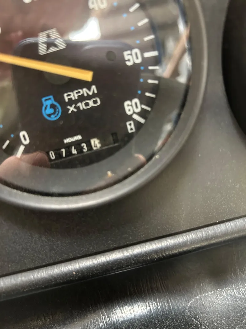 Slide: The Image of Close-up of 1996 MasterCraft 205 PRO STAR tachometer showing 743.4 hours. - 10