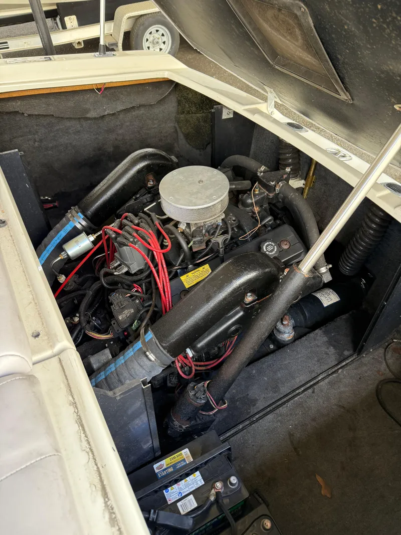 Slide: The Image of 1996 MasterCraft 205 PRO STAR engine compartment with visible components and wiring. - 12