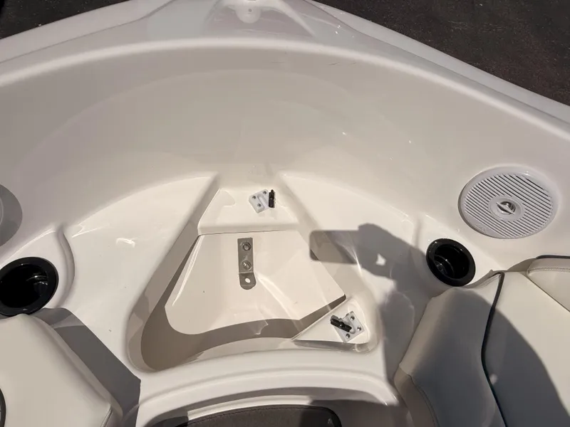 Slide: The Image of 2016 Yamaha SX190 boat interior, featuring seating and cup holders. - 17