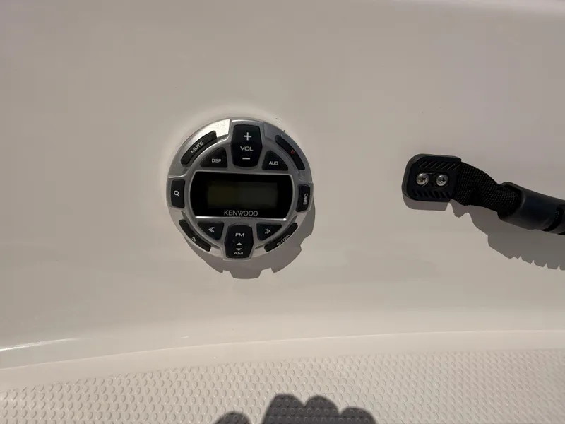 Slide: The Image of Kenwood audio control panel on 2016 Yamaha SX190 boat dashboard. - 5