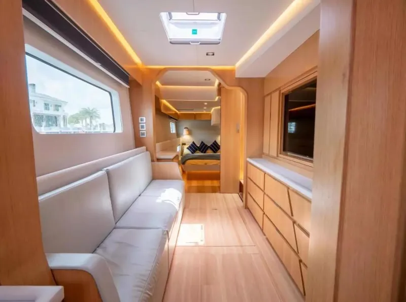 Slide: The Image of Luxurious interior of 2026 McConaghy MC63P Tourer yacht with modern design and comfortable seating. - 13