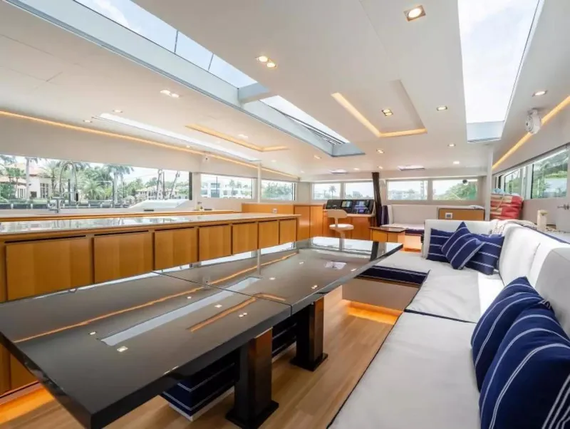 Slide: The Image of Luxurious interior of 2026 McConaghy MC63P Tourer yacht with modern design and spacious seating. - 9