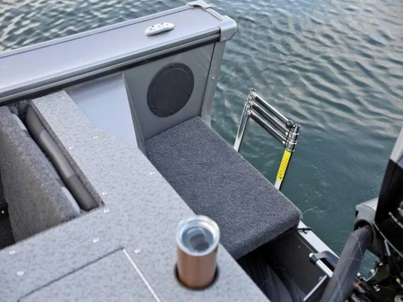 Slide: The Image of 2026 Lund 1875 Fisherman boat interior with seating and water view. - 10