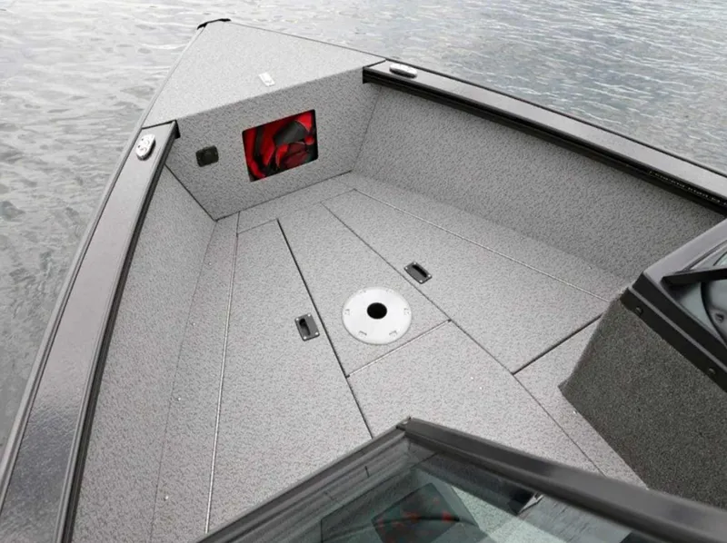 Slide: The Image of 2026 Lund 1875 Fisherman boat interior with gray deck, on calm water. - 3