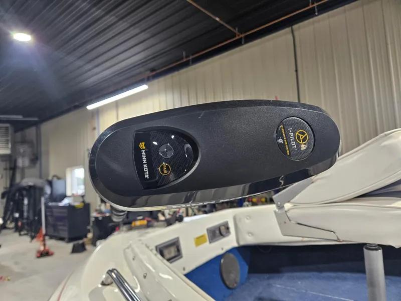 Slide: The Image of 1997 Yar-Craft 192 Michigan boat with Minn Kota trolling motor in a garage setting. - 8