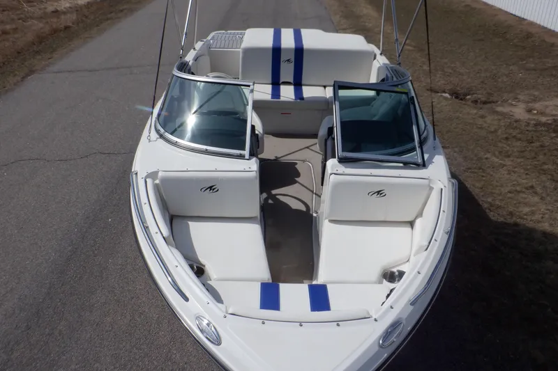 Slide: The Image of 2014 Monterey 196MS boat on trailer, side view, outdoors. - 10
