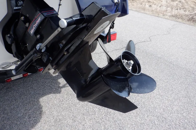 Slide: The Image of Blue canopy of a 2014 Monterey 196MS boat against a clear sky. - 12