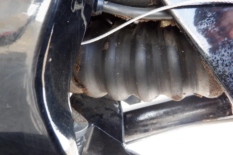 Slide: The Image of Outboard motor of a 2014 Monterey 196MS boat on a trailer. - 13