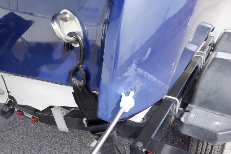 Slide: The Image of 2014 Monterey 196MS boat in blue on a trailer, side view. - 15