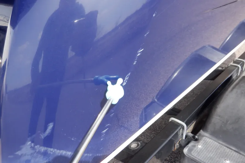 Slide: The Image of 2014 Monterey 196MS boat on trailer, showing rear hook and strap attachment. - 16