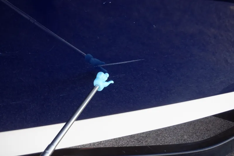 Slide: The Image of Blue scratch repair on 2014 Monterey 196MS boat hull. - 21