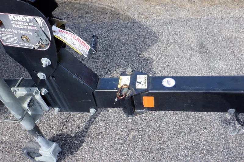 Slide: The Image of 2014 Monterey 196MS boat on trailer, blue hull, parked on road. - 25