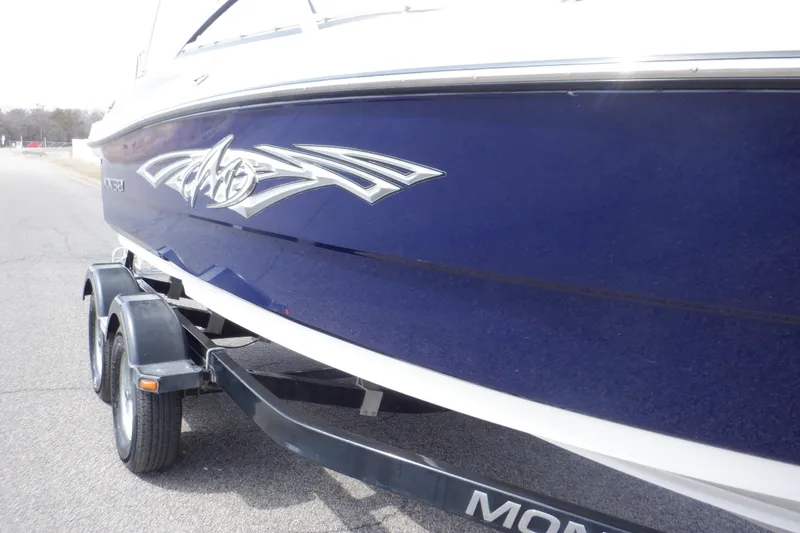 Slide: The Image of Trailer hitch of a 2014 Monterey 196MS on asphalt surface. - 26