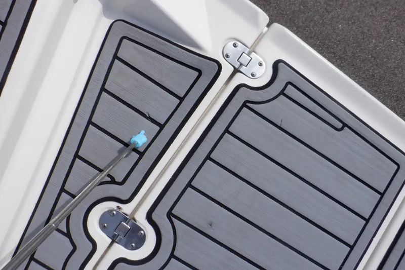 Slide: The Image of 2014 Monterey 196MS boat deck with gray and blue accents. - 32